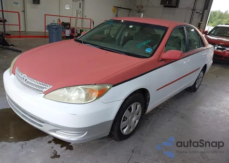 2003 Toyota Camry Le z USA, uszkodzony, nr VIN 4T1BE32K33U673674